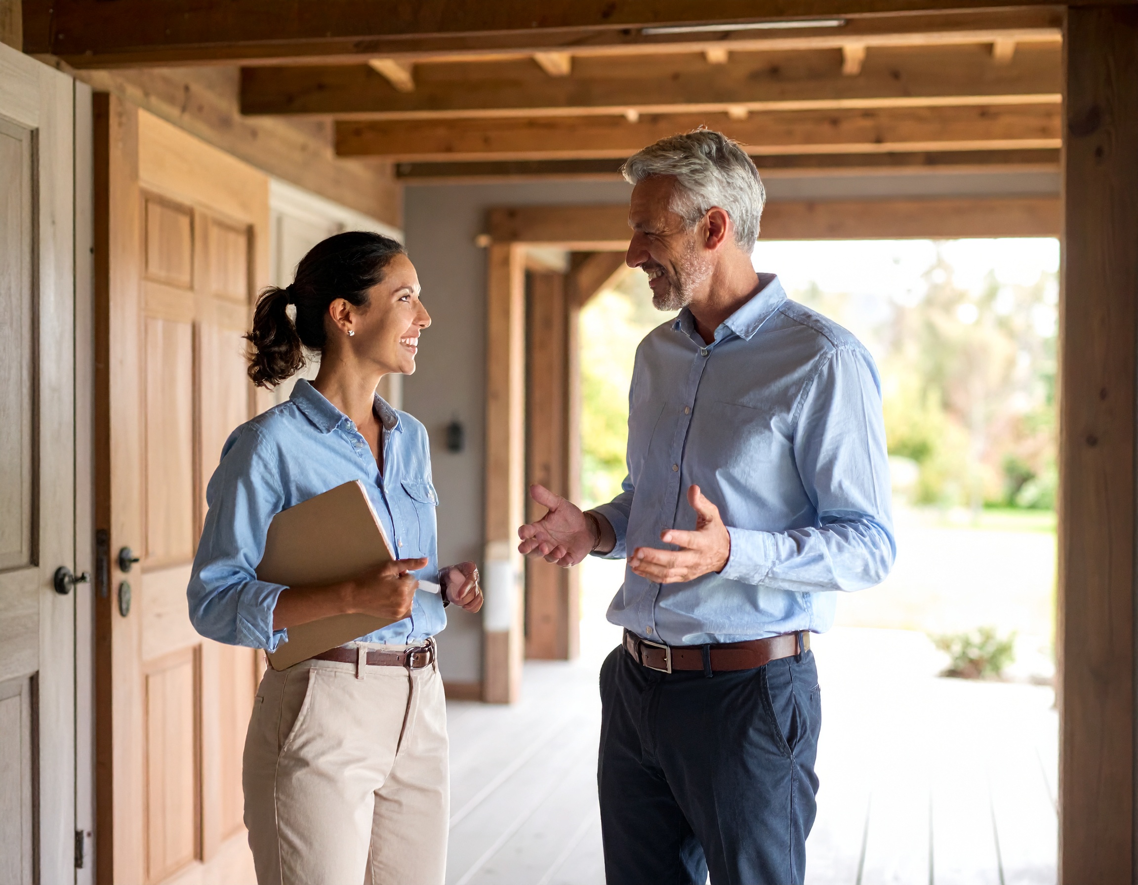 Remodeling professionals walking through a premium project