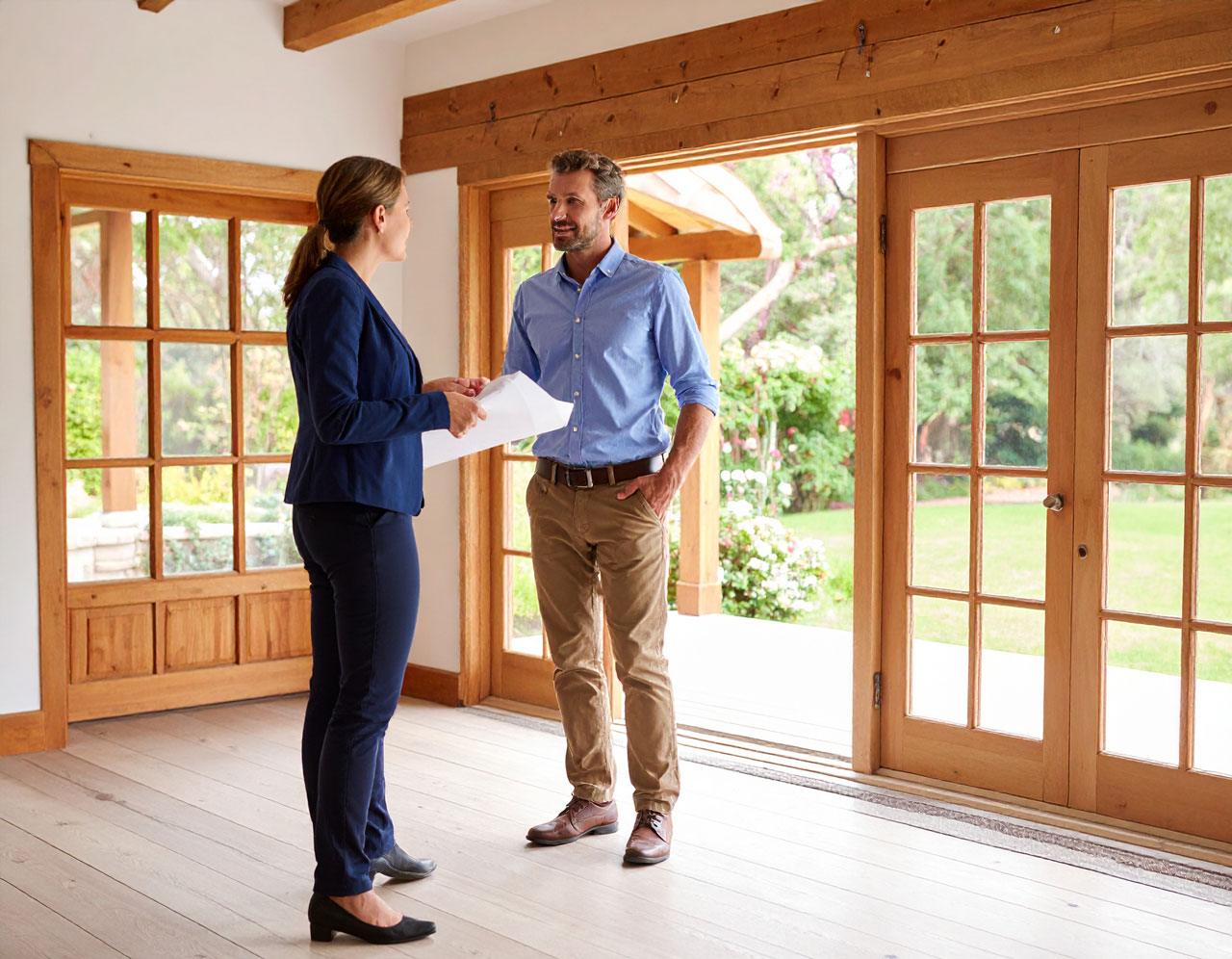 Contractor meeting with a homeowner in a premium home